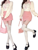 Korean version of the pink series of sweet and spicy wind three-piece suit women's spring new kitten hanging neck vest cardigan high waist skirt